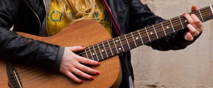 How to Strum a Guitar: A Beginner's First Lesson