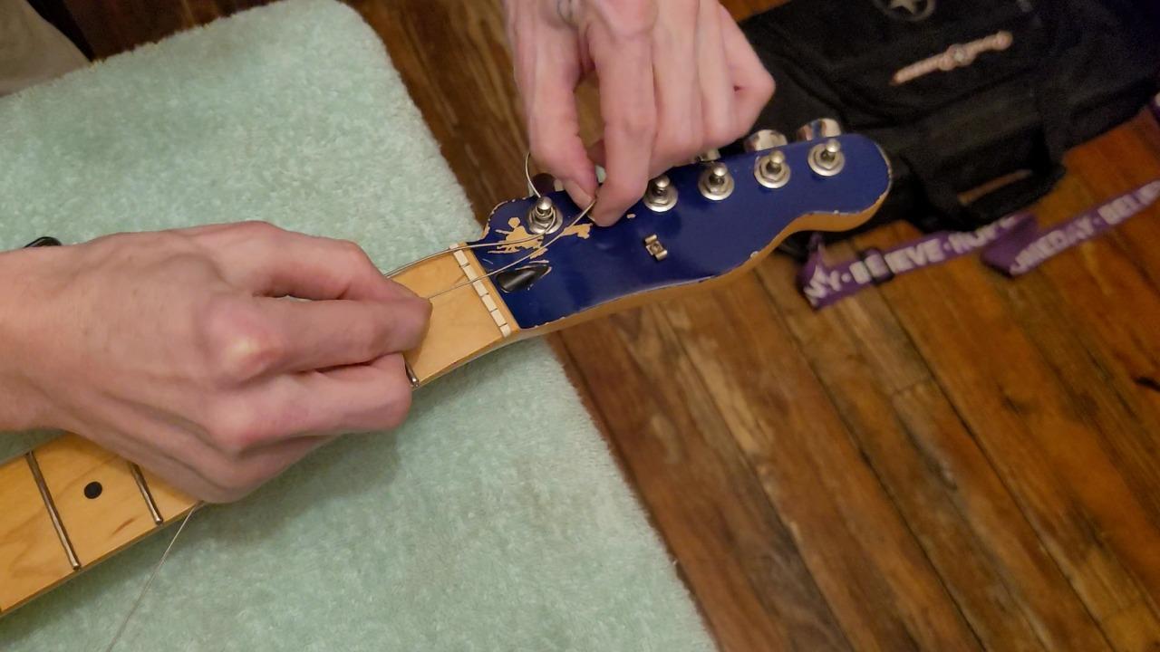 A Guitar Stringing Technique For More Comfortable Playing
