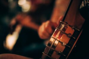 Close up of a banjo with the background blurred