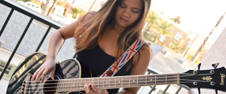 girl playing guitar - bass guitar tabs