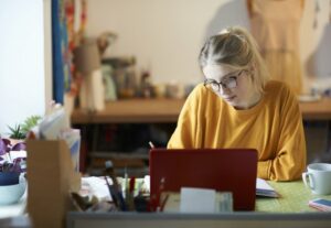 Female college student studying online