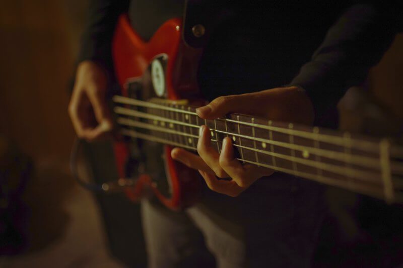 The 7 Best Bass Guitar Songs for Beginners (With Tabs & Videos)