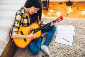 a young musician creates a music practice schedule
