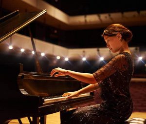 a pianist learns how to improve her musicality