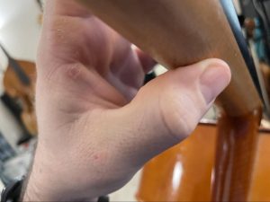 demonstration of cello thumb position