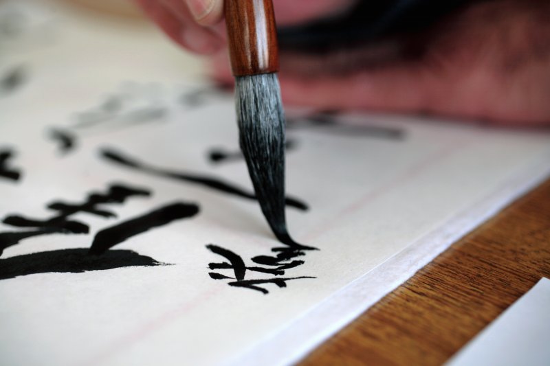 Close up of freshly written calligraphy words