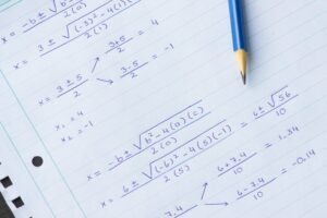 Quadratic equations solved in blue pencil