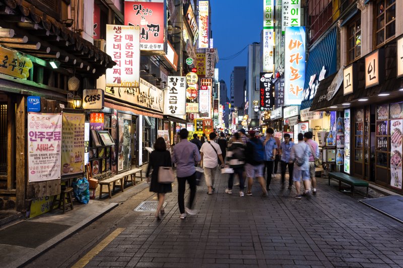 People walking around downtown Korea