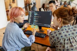 Office woman working with a coding tutor