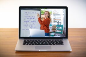 Female tutor teaching an SAT math course online